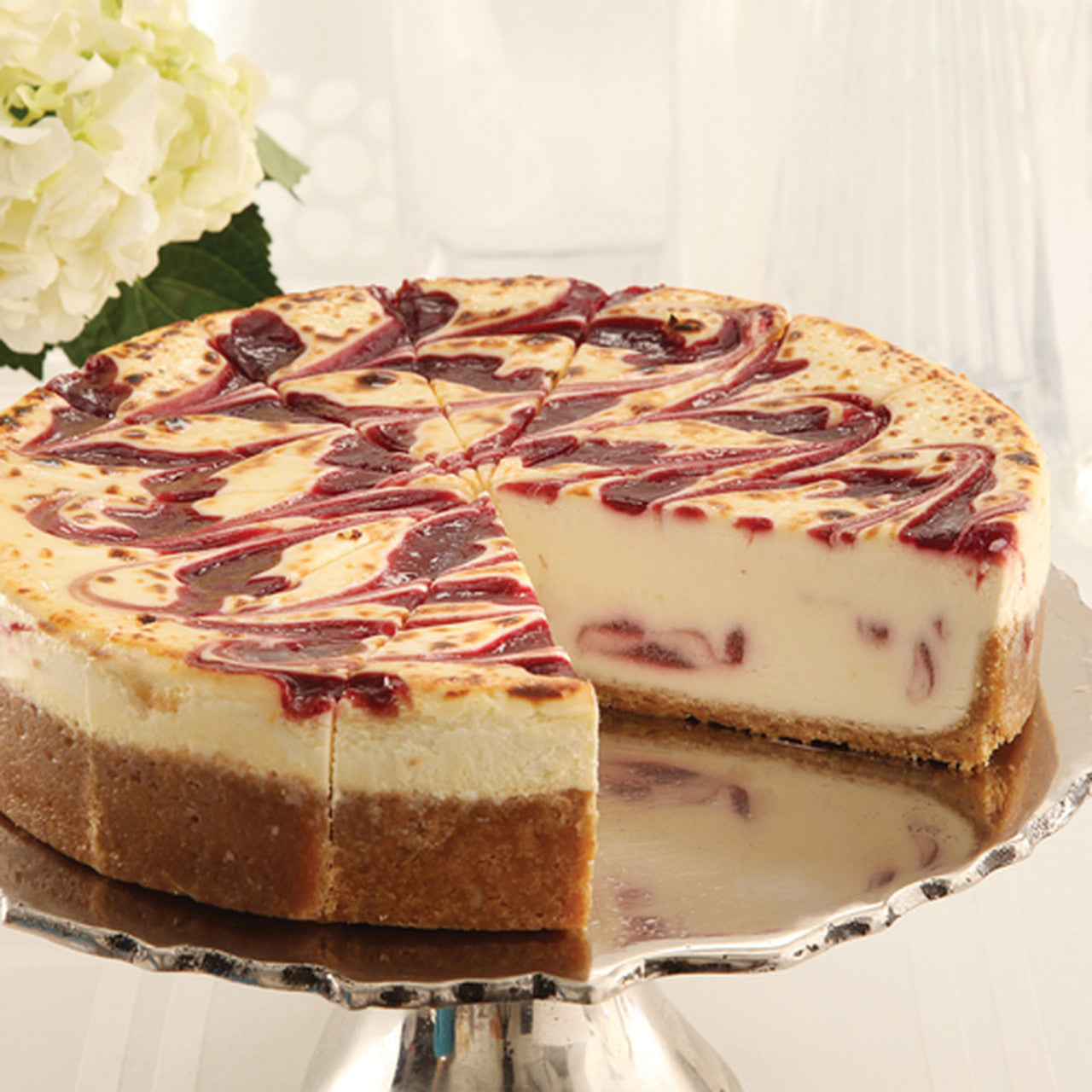 White Chocolate with Raspberry Cheesecake – 28 Slices (2 Cakes, 14 Slices Each)