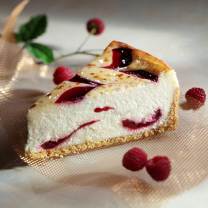 White Chocolate with Raspberry Cheesecake – 28 Slices (2 Cakes, 14 Slices Each)